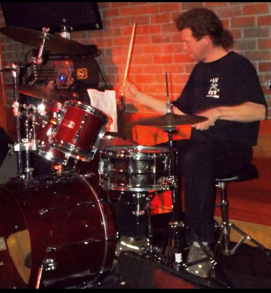 Chris — drums and vocals