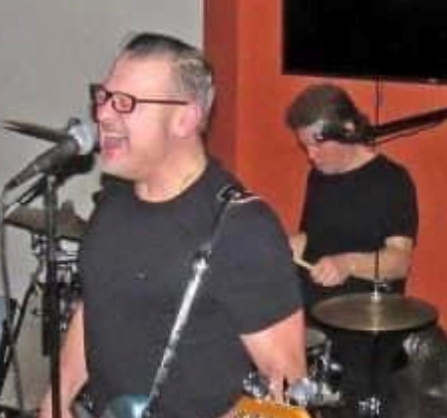 Perry and Chris performing together