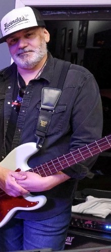 Robert — bass and vocals